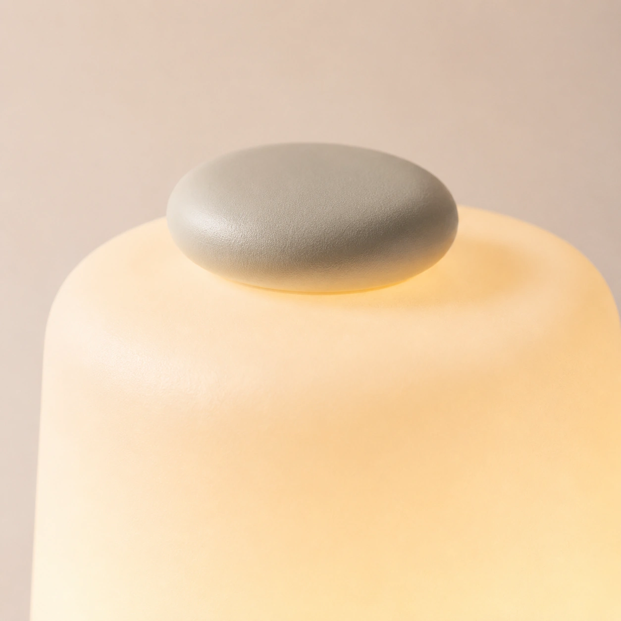Hatch Baby Big Button style control detail with soft nursery light Hatch Baby Big Button style control detail with soft nursery light